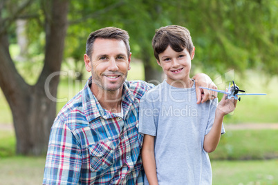 Father and son having fun in the park