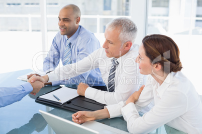 Businessman shaking hand during work interview