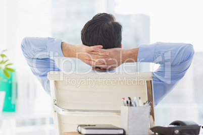 Businessman relaxing in his chair