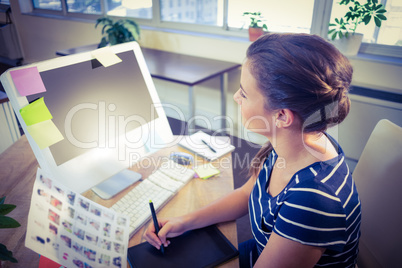 Happy editor working at her desk