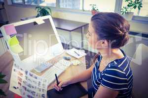 Happy editor working at her desk