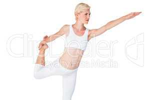 Fit woman stretching her leg