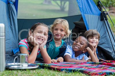 Happy siblings on a camping trip