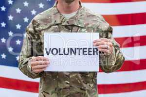 American soldier holding recruitment sign