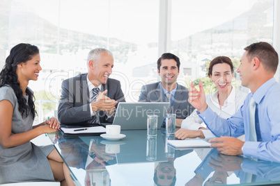 Business team laughing together