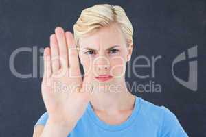 Stern woman gesturing with her hand