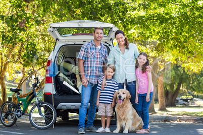 Happy family getting ready for road trip