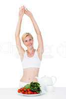 Fit woman stretching her body