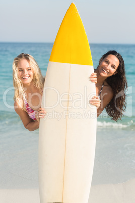 two friends in swimsuits