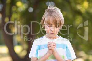 Little boy saying his prayers