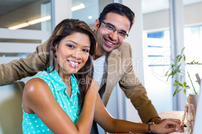 Smiling partners looking at camera