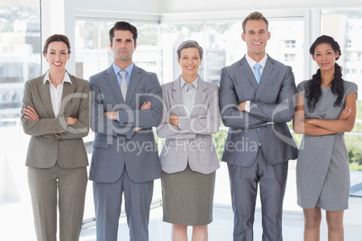 Business people standing in a row