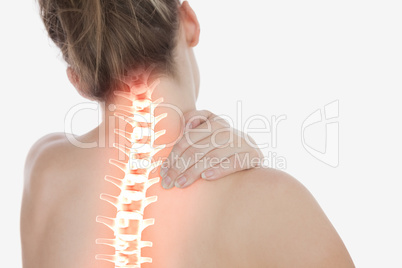 Highlighted spine of woman with neck pain