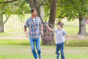 Father and son having fun in the park