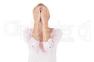 Nervous blonde woman covering her face