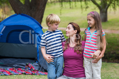 mother and children having fun in the park