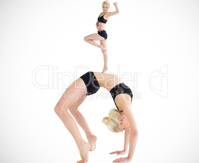 Composite image of side view of a fit young woman doing the whee