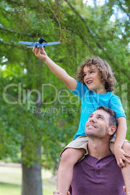 Father and son having fun in the park