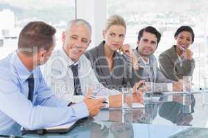 Business team having conversation at conference