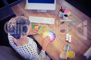 Interior designer working at desk