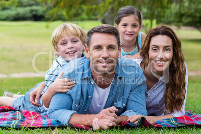 Happy family in the park taking selfie