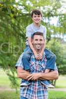 Father and son having fun in the park