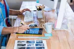 Businessman working with digitizer at his desk