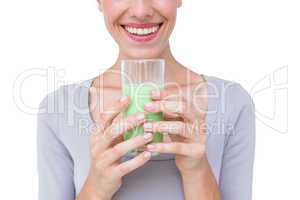 Fit woman holding healthy juice
