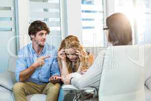 Psychologist helping a couple with relationship difficulties