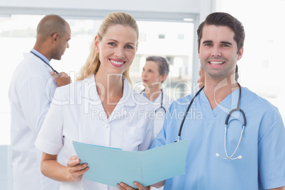 Team of doctors working on their files