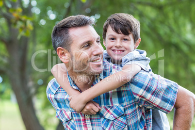 Father and son having fun in the park