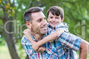 Father and son having fun in the park