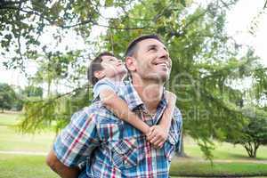 Father and son having fun in the park