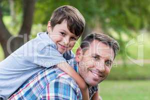 Father and son having fun in the park