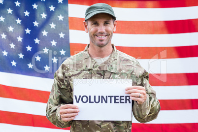 American soldier holding recruitment sign