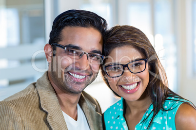 Portrait of smiling partners posing together