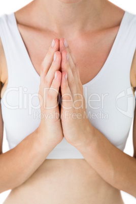 Fit woman praying