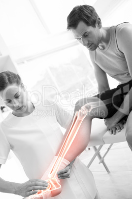 Highlighted knee of injured man at physiotherapist