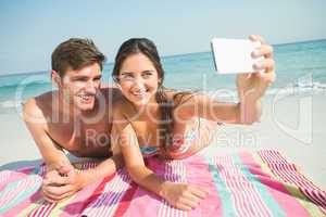 happy couple taking selfie