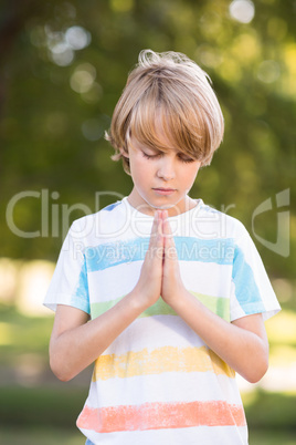 Little boy saying his prayers