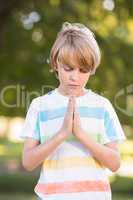 Little boy saying his prayers