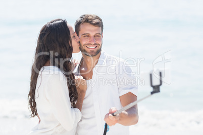 happy couple taking selfie