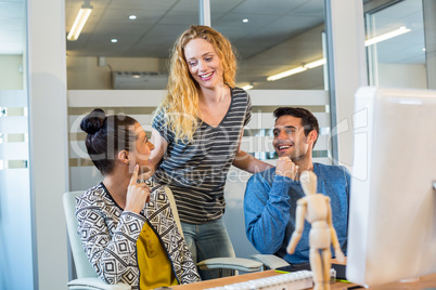 Smiling business laughing together