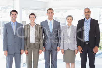 Business people standing in a row