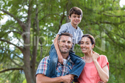Happy family in the park together Happy family in the park together