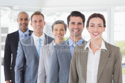 Business people standing in a row