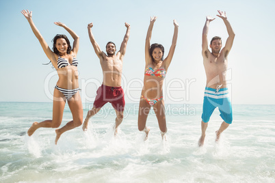 group of friends in swimsuits