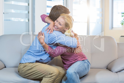 Reconciled couple hugging