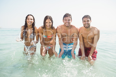 group of friends in swimsuits