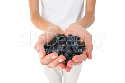 Woman holding blueberries